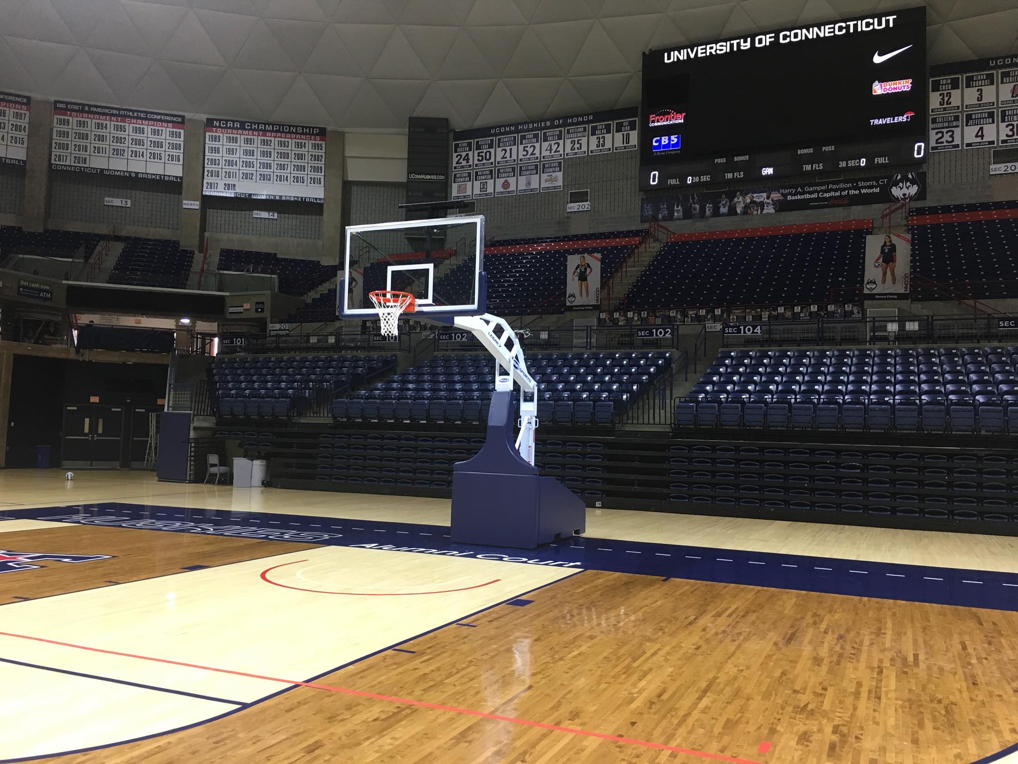 College basketball floor installation