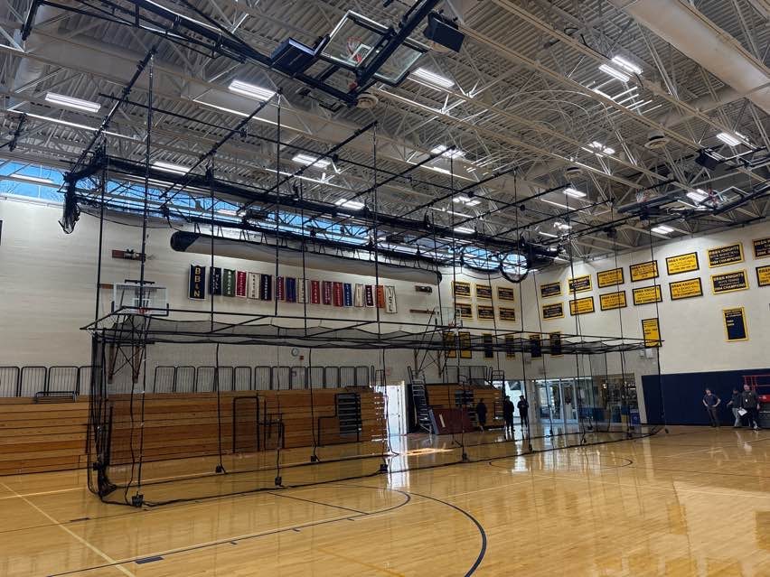 Gymnasium Equipment Installation Buckingham Browne Nichols School Completed Batting cage replacement completed during Gymnasium Equipment Installation at Buckingham Browne & Nichols School.