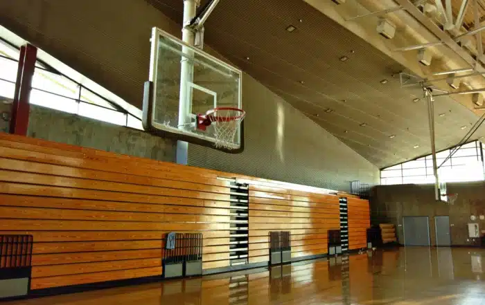 technician repairing gym equipment and performing maintenance to extend the lifespan of fitness machines