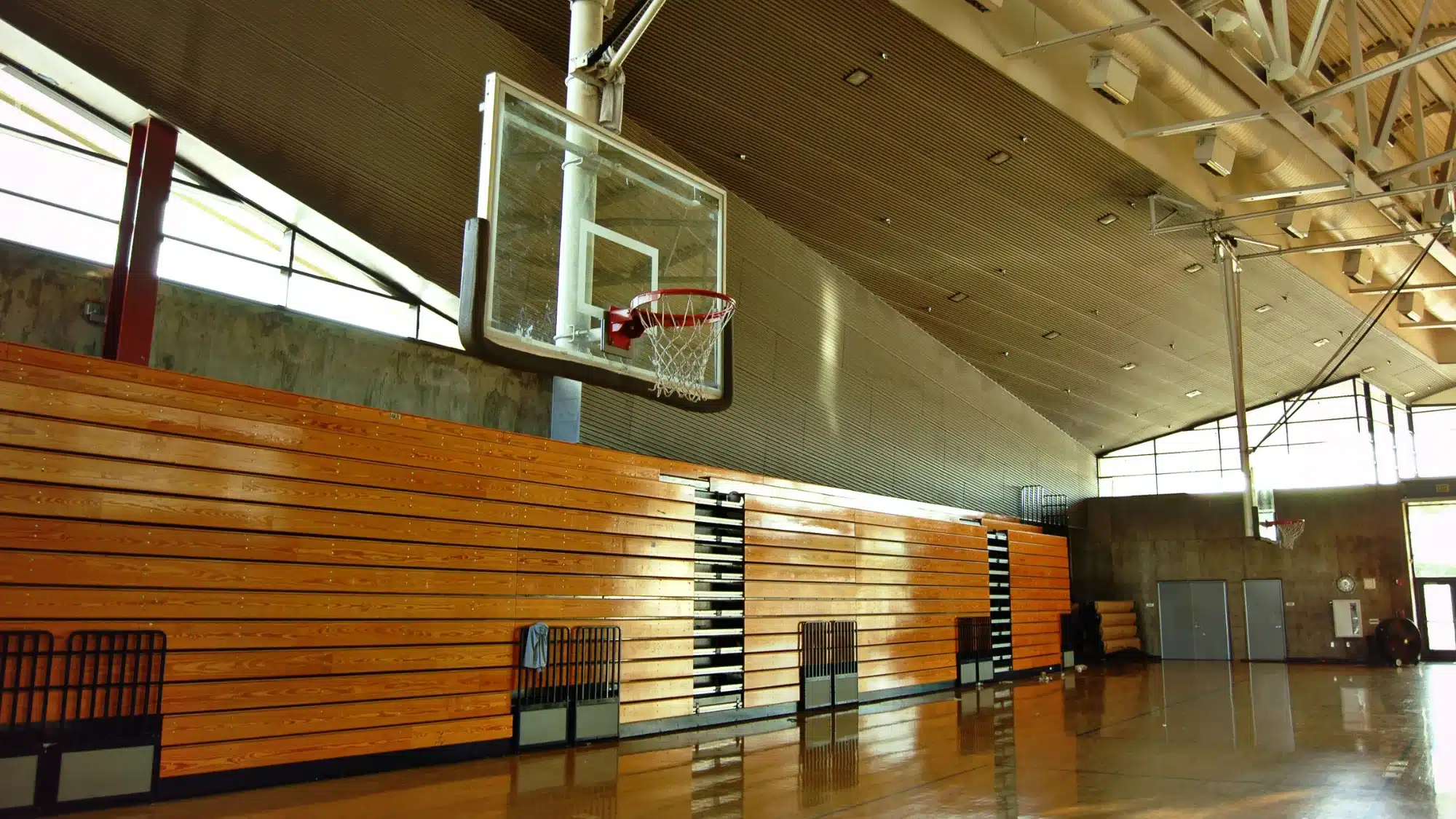 technician repairing gym equipment and performing maintenance to extend the lifespan of fitness machines