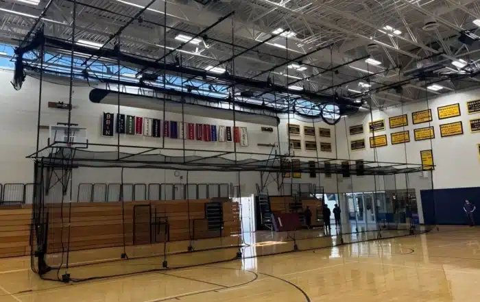 technician performing gym equipment servicing and safety inspection to ensure efficient and safe operation of fitness machines