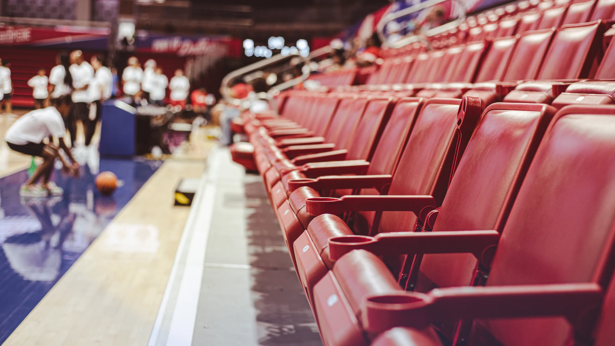 Skilled technicians performing urgent bleacher repairs in a stadium, prioritizing spectator safety.