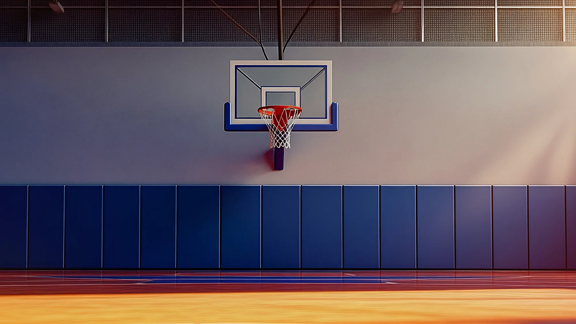 Close-up of worn basketball gym wall pads in a Woodstock, CT gym